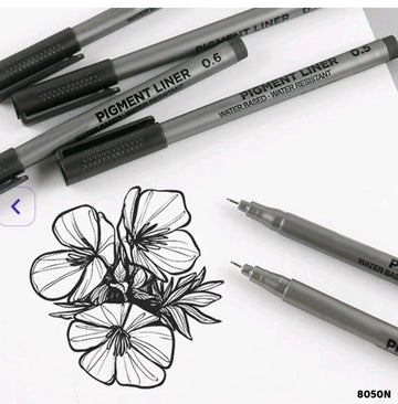 A set of precision pigment liner pens with black ink, displayed alongside a drawing of a flower on paper. The pens have precision tips, ergonomic grips, and are smudge-proof, waterproof, and fade-resistant.