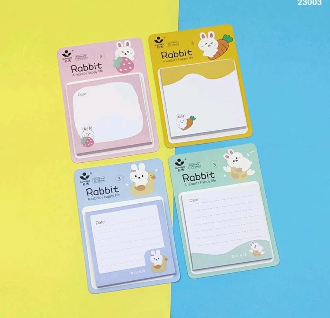 Image of a colorful Kawaii sticky notepad with various designs, showing its compatibility with different pens and durable, ink-resistant paper.