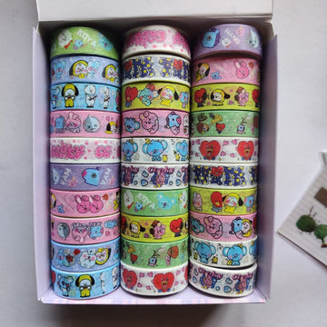 Image of colorful deco tapes featuring various designs and patterns. Perfect for journalling, scrapbooking, and DIY projects. Made with high-quality washi tape material. Enhance your aesthetic and add a pop of color to your creative endeavors.