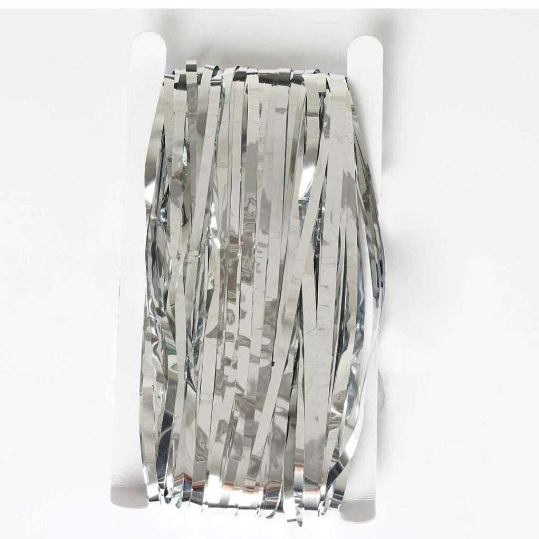 https://inkarto.com/cdn/shop/products/ranawat-agency-decoration-supplies-silver-metallic-fringe-foil-curtain-36646369362133.jpg?v=1694069154&width=1946